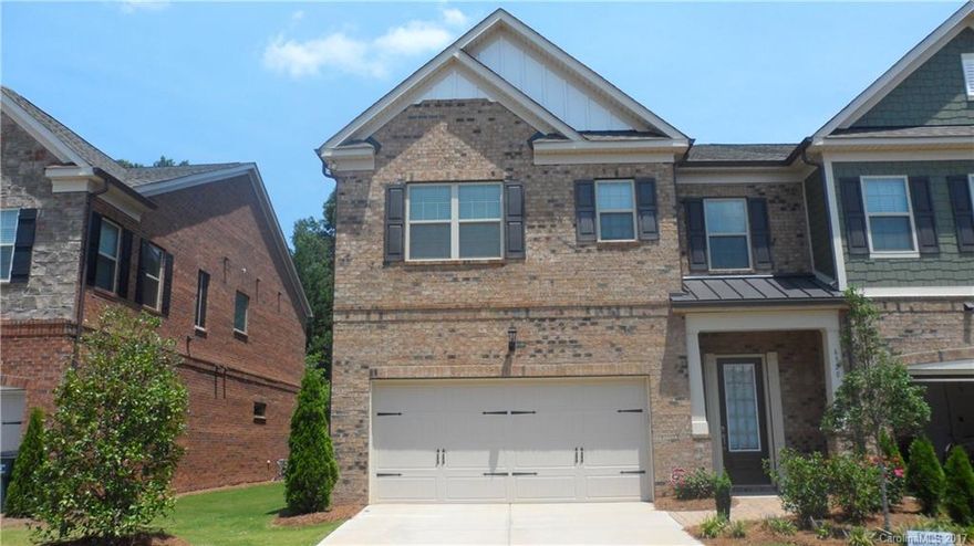 GATED EXECUTIVE TOWNHOUSE COMMUNITY IS IMPRESSIVE! OPEN FLOOR-PLAN HOME OFFERS CAREFREE LIVING AT ITS BEST. HARDWOOD FLOORS ON MAIN LEVEL. DINING ROOM W/ COLUMNS. LIVING ROOM W/ COFFERED CEILING & STONE FIREPLACE. GOURMET KITCHEN W/ GRANITE, BEAUTIFUL CABINETRY, UPGRADED APPLIANCES, BREAKFAST AREA. ENORMOUS MASTER SUITE W/ SITTING AREA & SCREENED IN BALCONY. SPACIOUS SECONDARY BEDROOMS EACH W/ FULL BATH & WALK IN CLOSET. LAUNDRY ROOM. SCREENED IN PORCH & PATIO OVERLOOK PRIVATE BACKYARD.