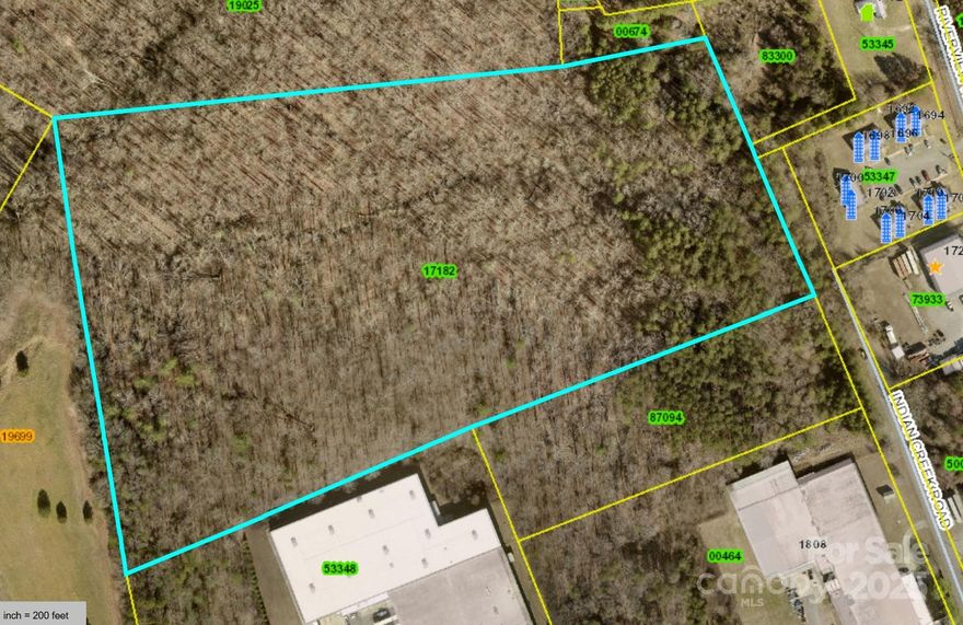 Prime opportunity with over 22 acres of mostly wooded land featuring a variety of topography and endless potential. This commercial parcel includes deeded access to public water and sewer from a neighboring property fronting Riverview Road, offering a valuable utility connection for future development. While currently zoned for commercial use, the property may hold potential for residential rezoning—buyers should note that such a change could affect access to public utilities, including the loss of sewer service and possibly water. With its mix of terrain, natural setting, and strategic location, this tract is ideal for investors or developers seeking a versatile land opportunity. Also includes an old well, condition unknown.