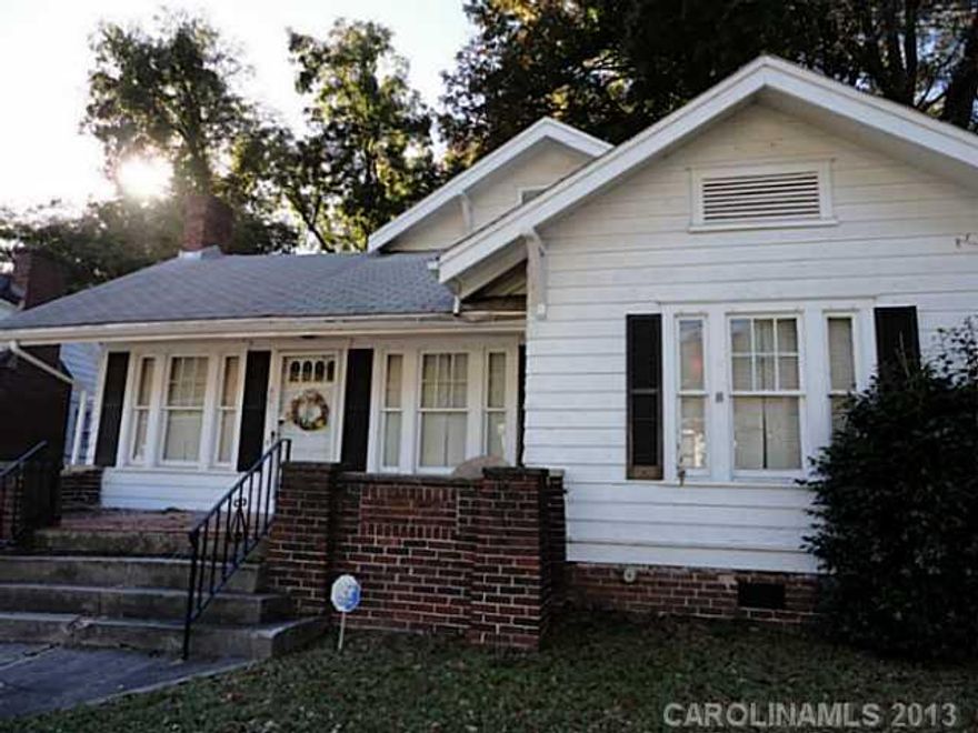 Historic  3 Bedroom 2 bath Bungalow home.  Features Large living room with fireplace,  Formal dinning room, breakfast room off the kitchen.  Master bedroom with bath, wood floors in bedrooms and hall and a glassed in porch off hall for relaxing.  This is a must see. Put your personal touch on this home. Reduced.
