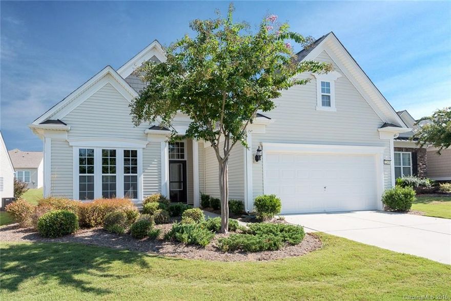 Custom Hardwoods, Ceiling Fans, Lighting, Blinds, Shades, & Cornices Throughout;  Pull-Out Cabinets; Gourmet Kitchen w/ Computer Niche, Pantry, Can Lighting, & Breakfast Nook; Finished 2 Car Garage w/ New Opener, 4ft Extension, Insulation, Storage w/ Flooring & Ladder Access; Sunroom w/ Added HVAC System, Removable Glass Windows Retractable Screens, & Ceramic Tile. Entertainer’s Dream Backyard with Extended Brick Paver Patio & Deck; 55+ Active Adult Community.