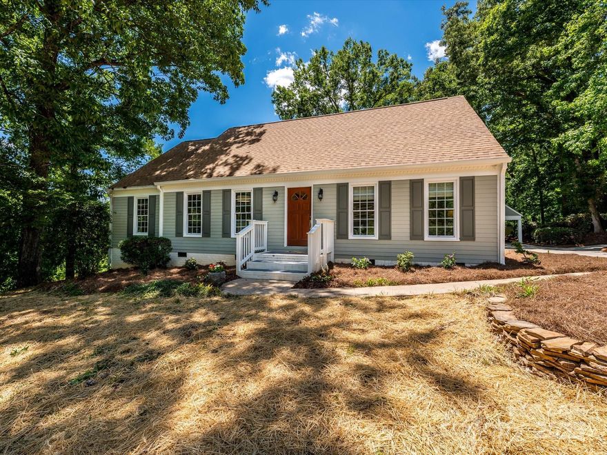 Welcome to this charming Cape Cod that is truly a “country retreat” within the city!  Come see this to believe it… beautiful & serene home that sits on 2 lots.  Countryside views with a large pond w/ stand-alone and floating docks.  Relax outside on the 2-level deck or on bricked firepit patio to enjoy all the nature.  Updates are new roof (2024), refinished h/w’s (2025), fresh paint, new carpet, HVAC (2022) on main and upstairs, walk-in crawl space w/ vapor barrier, and walk-in attic.  Large kitchen opens to family room, that flows into the tranquil sunroom w/ wet bar… surrounded by windows w/ amazing views of the mature trees, countryside and pond.  Primary bed suite on main, spacious laundry room w/ storage, coffee bar, and finished, walk-out basement w/ full bath has many possibilities!  All of this on 3.06 acres in classic Stonehaven – close to Boyce Rd Park, McAlpine trails, Sardis Swim Club, & wonderful private schools and public schools close by!