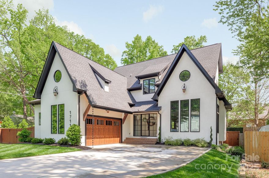 Welcome to this fully custom Fusterio designed, one of a kind home in the heart of Charlotte’s coveted Midwood neighborhood. Completed in 2022 with every detail carefully curated by the present owners and their design team. The statement steel door entryway off the courtyard drive gives way to the great room with a dramatic 25ft cathedral ceiling and anchored by an oversized gas fireplace. Incredible kitchen featuring Crestwood Custom Cabinetry with paneled appliances, 36” gas range, premium quartz countertops with waterfall island and scullery inspired pantry. Indoor-outdoor living personified with full sightline and flow into the 455 sqft covered and screened outdoor living area through 12' sliding glass door. Main level oversized owner’s suite is simply to die for with spa inspired bathroom. Four secondary bedrooms including au pair suite/gym and lounge/play area on second level. Ultra high end premium fixture selections throughout this must see custom home.