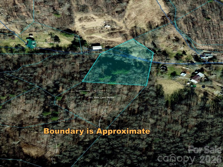 This 1.20 acre, unrestricted parcel provides a secluded setting surrounded by natural beauty.  Enjoy true freedom to create your ideal mountain retreat.  This unrestricted parcel allows for site-built homes, manufactured homes, tiny homes, yurts, or RV/travel trailer living.

Enjoy the best of Western North Carolina living with a stocked trout stream just minutes away, scenic back roads perfect for biking, and abundant hiking trails nearby including the Appalachian Trail. Spend winters skiing at nearby Hatley Pointe Ski Resort, explore the iconic beauty of the Big Bald or Max Patch, two of the many bald mountains in Madison County. Explore the scenic back roads as you drive to the charming mountain towns of Mars Hill, Marshall and Hot Springs.  This is a property that offers more than a place to live…it offers a way to live.

 Conveniently located just 15 minutes from I-26 (Exit 3), 25 minutes to Weaverville and 35 minutes to Asheville, this property offers both seclusion and accessibility.

To respect the privacy of neighboring homeowners, drive-bys are discouraged. Showings by appointment only.  Please contact your real estate agent. 
“Your mountain is waiting, so… get on your way.” – Dr. Seuss