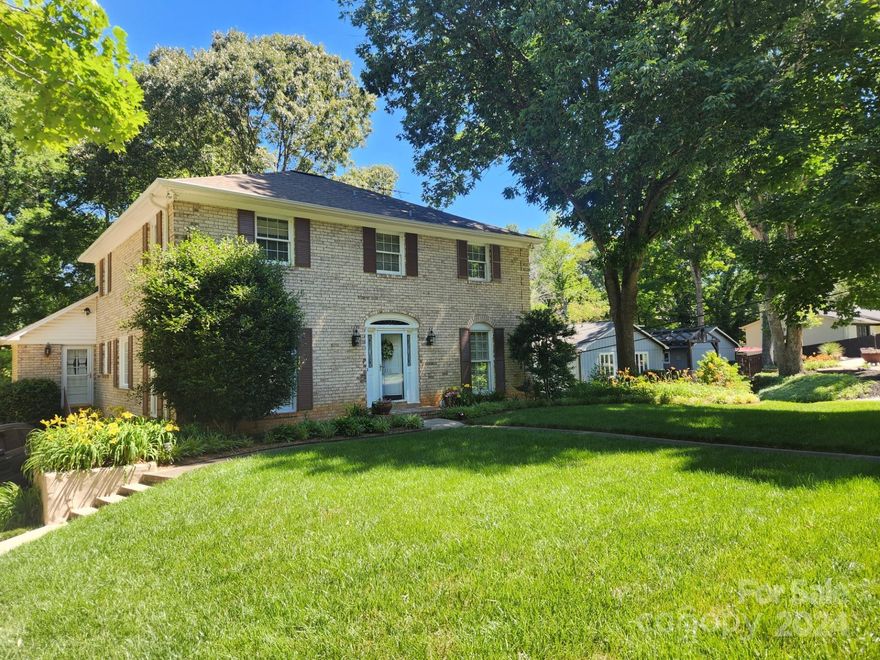 This lovingly cared for, one owner, traditional charmer offers room to spread out and then some!!!
Featuring 4 large bedrooms (all with very generous closet space) an upstairs office (with custom built ins), 2 full baths (one with a jetted tub) and 2 half baths, this delightful home has it all!  You'll enjoy the main level which features the formal living and dining rooms, large, eat in kitchen, cozy den (with wood buring FP), bright sunroom space (with gas FP) and thoughtfully designed back entrance with large walk in laundry room and drop zone.  The fully finished basement space offers a huge bedroom, 2nd family room (with gas FP), wet bar and access to a DREAM workshop (with built in work tables and shelving)!!! There is also a huge outdoor shed (with lighting) for storing lawn equipment. This pretty hidden gem, situated on a heavily wooded lot in the beautiful, established neighborhood of Ravenwood, is just waiting for you!!!