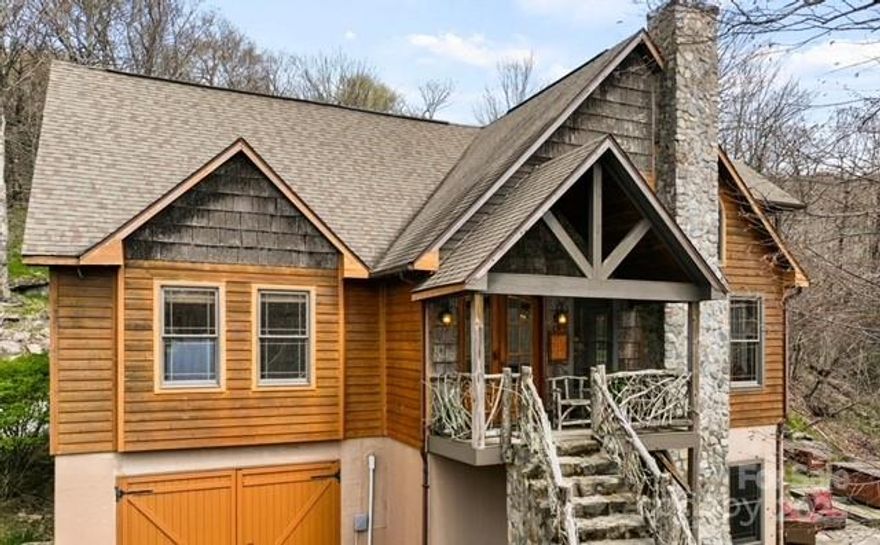 High Country’s most scenic setting. Property runs "road to road", nestled on 1.7 acres with multistate sunset views and soothing sounds of Buckeye Creek that can be enjoyed from every room. Featuring level-entry access with all essential rooms—including the primary suite—on the main floor for single-level living. Vaulted ceilings and large windows frame the mountain and creek views. Outdoor living includes a hot tub overlooking the creek, a covered stone patio and a stone fireplace perfect for cozy mountain evenings. Beech Mountain's year-round activities include skiing, hiking, tennis, dining, and more. Optional Beech Mtn. Club membership offers golf, tennis, pickleball, heated pool, fitness center, and fine dining. Furnished and turnkey. Home is currently owned in a partnership. Listing is for 100% ownership BUT possible fractional ownership may be available.