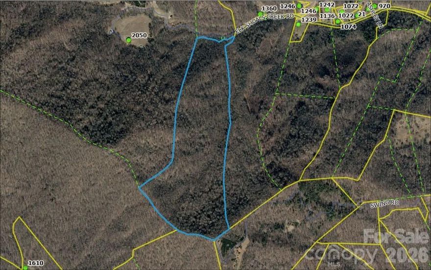 Land is the Best Investment!  This wooded mountain acreage has direct access to State Paved Road and near end of Elk Shoal Creek Road. Spectacular views from this property can be enjoyed from multiple homesite locations. Property elevation goes from approx. 3,000 ft. at entrance to property and is approx. 4,200 feet near the top elevation.  A rough ATV or side by side dirt roadway goes through property but is not suitable for 4-wheel drive vehicle access.  Hiking property provides best option for viewing this acreage.
