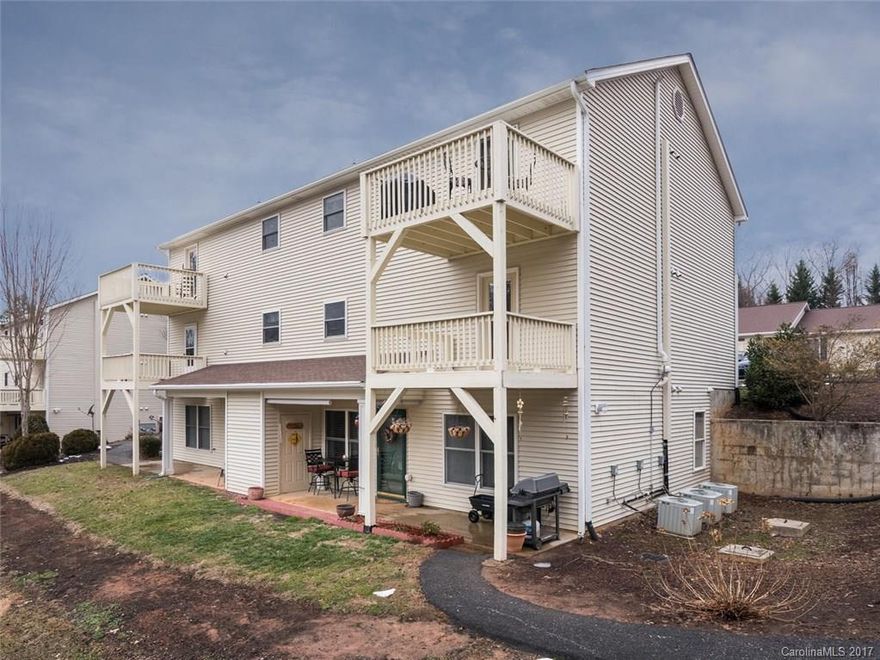 Great lower level condo with private feel in Woodland Trails! This home has an inviting open  floorplan with beautiful finishes and plenty of storage. You will enjoy hanging out on the patio and taking in the amazing wooded & green space to the rear of the building for some much needed relaxation. The Woodland Trails community is just off Queen Rd and very convenient to Asheville & beyond. Take your first step to maintenance free living by scheduling a showing today!