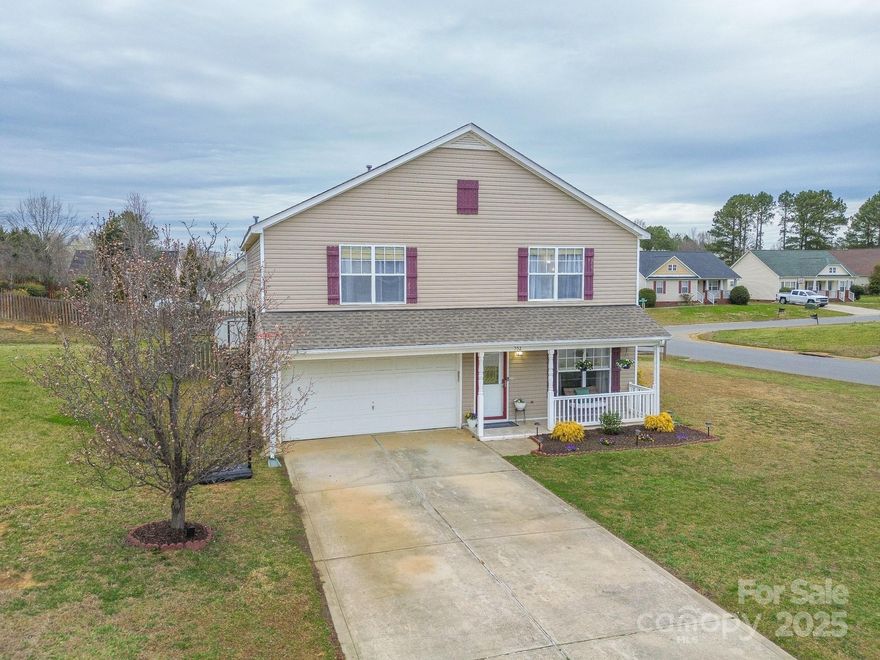 Nestled on a quiet corner lot, this beautifully maintained home offers the perfect blend of style and function. The main floor features a versatile floor plan, with a living room, dining room, and spacious great room with a gas fireplace. The open kitchen provides an abundance of granite countertops, breakfast bar and ample cabinet storage with even more pantry storage space in the off-kitchen laundry. Upstairs, a spacious loft is perfect for work, play or relaxation, while the secondary bedrooms provide generous space and walk-in closets. The primary suite is a true retreat, easily accommodating oversized furniture, featuring cathedral ceiling, dual closets, and en-suite bath with dual vanity and soaking tub. Enjoy outdoor living with a fenced backyard, deck perfect for entertaining, and a storage shed for your outdoor equipment plus a 2-car garage with durable epoxy flooring and shelving. Ideally located near parks, shopping, dining and top-rated schools. Schedule your showing today!