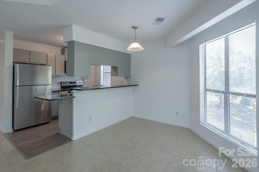 Completely renovated Condo!  Amazing location, with easy access to highways, shopping, and dining. This unit is better than new. Renovations include new stainless steel appliances, granite, and a backsplash in the kitchen.  The flooring was upgraded LVP.  The bathrooms also boast's granite counter tops.  New fixtures, and fresh paint throughout complete the renovations.  Truly move in ready!