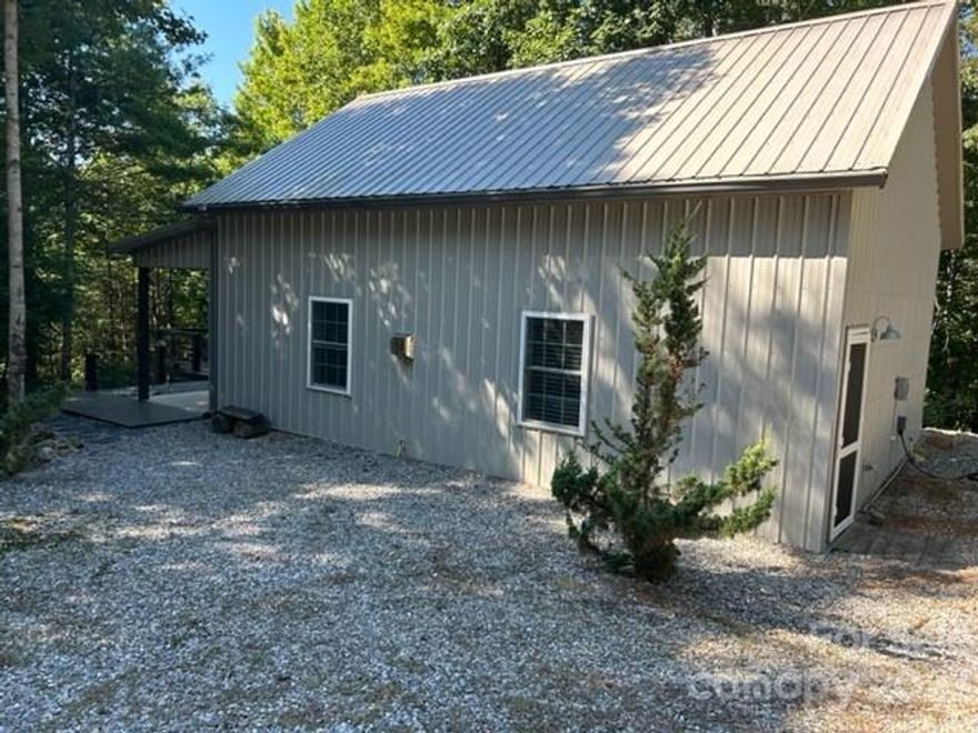Looking for a mountain get away that is self-sufficient? Fully furnished Cozy Mountain Poll Barn Retreat.  It was built in 2017 to be off the grid with the option to connect it to the grid.  It features propane heat, solar panels with a backup generator for electricity, and a water retention system.  Enjoy trout fishing in the Clear Branch stream which runs on the property or in the Middle Fork Reddies River which is less than 5 minutes from the property and has deed rights. This property is designed for those who enjoy the outdoors with a fire pit, and a large deck with built in slide.  It has a one-bedroom septic, electrical, building, and plumbing permit.  The property does not have a certificate of occupancy due to the fact it does not have public electricity connected or a well.  With the connection of public electricity, a well installed and some minor modifications, the property could receive a C/O.  The owner has meticulous records of the entire build. Fully Furnished.