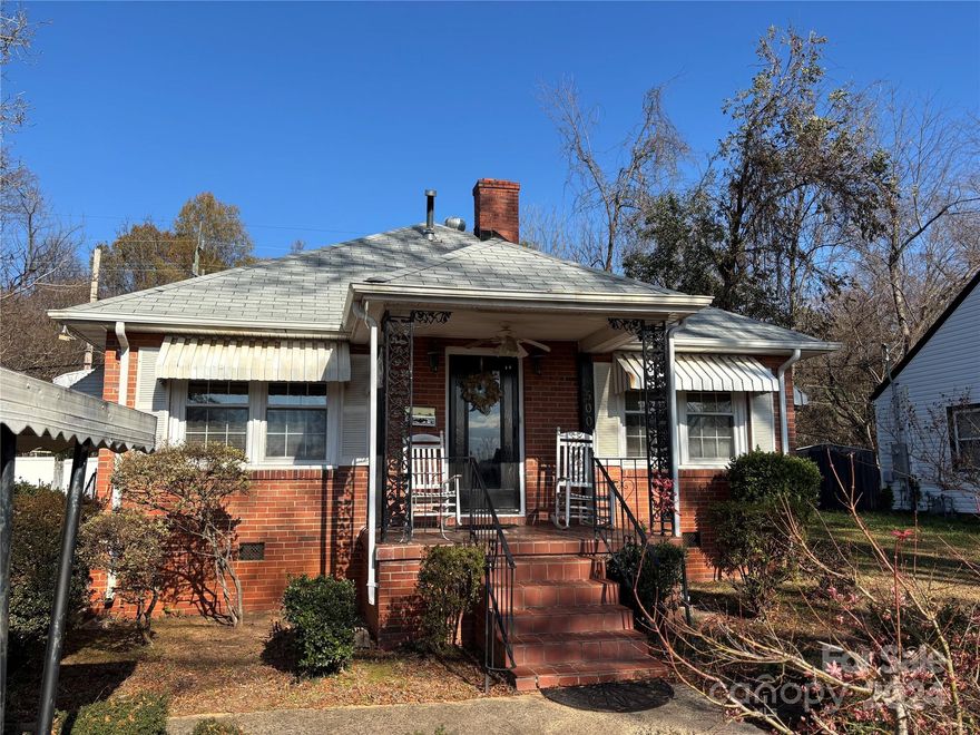 Location Location Location! Close to Southend and all that Charlotte has to offer, this home sits on a large, level lot.  The area is full of renovations & flips; grab the value in the location while you can! Full brick, bungalow style home with hardwood floors, recent roof and windows (approximately 10 years). There is gas service at the street, but the owner has capped off the gas to the house as they don't use it. The stove has a gas connection but they converted to electric some years ago. There is no A/C, and currently the furnace does not work, so they are using space heaters, which is why the financing needs to be cash or conventional.
