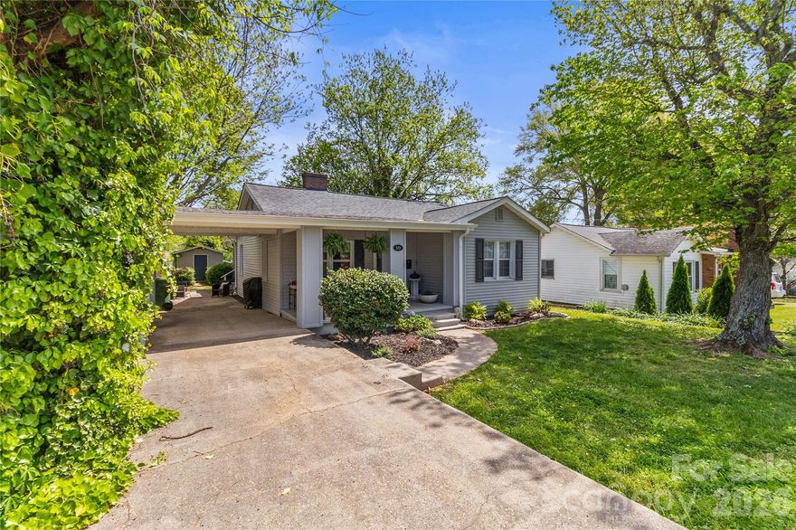 This charming bungalow offers the perfect blend of comfort and character. A welcoming covered front porch invites you in, while the screened-in back porch provides a peaceful spot to relax and unwind. The home also features a convenient porte-cochère for added functionality. Inside, you’ll find three cozy bedrooms and a full bathroom, along with a beautifully updated kitchen featuring new countertops and sleek stainless steel appliances—perfect for everyday living and entertaining alike. The spacious primary bedroom includes a generous 8' x 11' walk-in closet. The third bedroom is currently being used as a dining room, offering flexibility to suit your needs. The armoire will be reinstalled in that room prior to closing. Outside, the spacious yard offers plenty of room to enjoy the outdoors and includes two storage sheds, providing ample space for tools, hobbies, or extra storage.