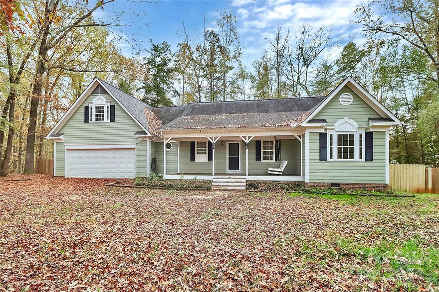 Welcome to your charming countryside estate! Nestled on .78 acres at the end of a quiet neighborhood, this stunning home offers you the best of both indoor and outdoor living. Passing through your spacious front porch, you're greeted by rich laminate wood flooring throughout your spacious and light filled living room. This space is open to your dining area and kitchen, and offers you access to your large screened in back porch for seamless entertaining. Back inside, you'll find the 3 spacious bedrooms have a split bedroom floor plan for privacy and all feature brand new carpet. The primary retreat features tray ceilings, a large walk-in closet and en-suite. The secondary bedrooms are sizable and share a full bath. Continuing upstairs, the options are endless with a large flex space. With brand new interior painting throughout and the crawlspace upfitted including new insulation and 6 mil vapor barrier, this home is truly move in ready and one of a kind!