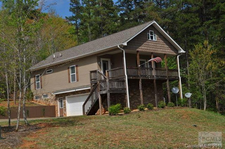 Are you looking for a home out in the country to enjoy the peacefulness? Sit on the deck and gaze across the horizon and relax in this spacious 3 bedroom and 3 bath home nestled on 1.13 acres of wooded and open views. If you like to cook, the large kitchen will supply you with plenty of cabinet and countertop space to meet your needs. Wood flooring displayed throughout the home and bathrooms have tile flooring. A large den in the full basement is great for entertaining and enjoying time with family or just relaxing. Also there is a office or hobby/craft room that will provide you with extra storage. The large double car garage will come in handy with room for parking and room left for storage.