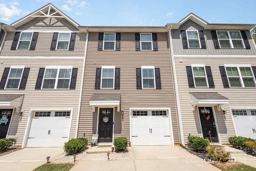 Discover your dream home in the heart of Fort Mill! This inviting 3-story townhome offers the perfect blend of style and comfort. The main level welcomes you with a sun-drenched great room, ideal for relaxation or entertaining. The elegant kitchen is a chef's delight, boasting stainless steel appliances, ample cabinet space, and a convenient kitchen island. A formal dining area sets the stage for entertaining. Upstairs, the spacious primary suite is your personal oasis, complete with a walk-in closet and an en-suite bathroom. Two additional bedrooms provide comfort for family or guests. The lower level provides valuable storage space, ensuring a clutter-free living environment. Step outside to your private patio, perfect for enjoying morning coffee or evening barbecues. You'll love the convenience of this prime Fort Mill location, with easy access to Carowinds, Carolina Place Mall, top-rated schools, and picturesque parks. Commuting is a breeze thanks to nearby I-77 and I-485.