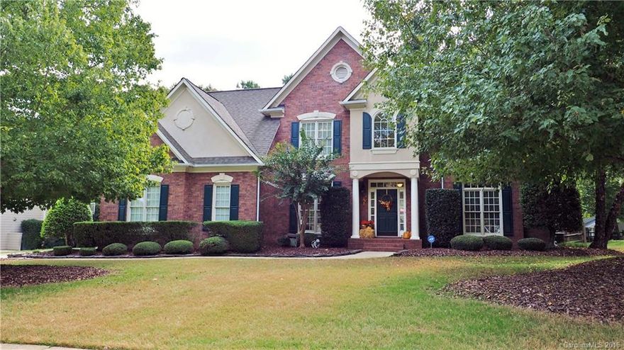 Rare John Wieland Home w/Special Custom Renovations inside done to tune of $30K! Three Sides Brick w/Large Screened Porch & Outdoor Deck w/Wooded Flat Back Yard Fully Fenced! Renovated Kitchen w/Granite,Updated Cabs, Newer SS Appl ~Family Room with Media Niche ~Wood Burning FP w/gas line! Extensive HRWDS on Main! Formal Dining & Living Rm/Office! Hard to find 4 BD & 3 Full Baths in home this size +3 Car Garage and  Separate 150 sqft Workshop with Separate Entrance! Home Warranty from HWOA Incl!