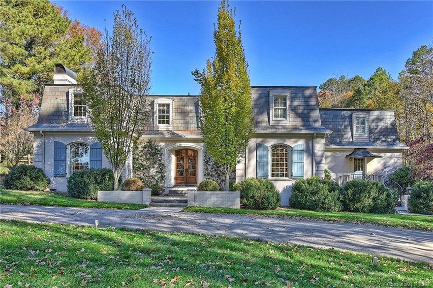 Elegant French Provincial Estate on 1 1/2 acres on the 10th fairway of Carmel CC's North Course. Gourmet KT w/oversized center island, honed marble tops & custom glazed cabinetry. Wonderfully inviting living areas on main, guest BR & full bath on main. Upper level master with spa-like MB featuring garden tub, steam shower & heated floors. All secondary baths recently updated, great bonus spaces. Gorgeous, professionally landscaped lot with fabulous salt water pool - a truly lovely home.