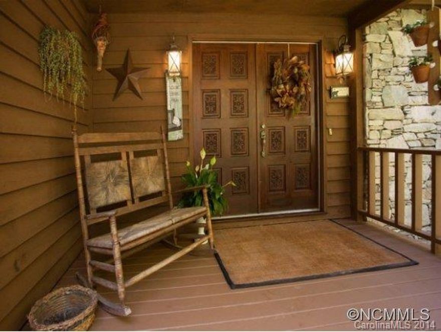 PRICE REDUCED!!! Fabulous Flat Rock home in prestigious Teneriffe subdivision. Nestled in a wooded setting w/level backyard. Cathedral ceilings in living room w/massive floor to ceiling stone fireplace, 425sf screened porch for outdoor living, master on main with exquisite master bath with claw foot tub, hardwood floors, remodeled kitchen with 17x16 sun room. Two guest bedrooms with family room on upper level. Over sized garage and level lot.