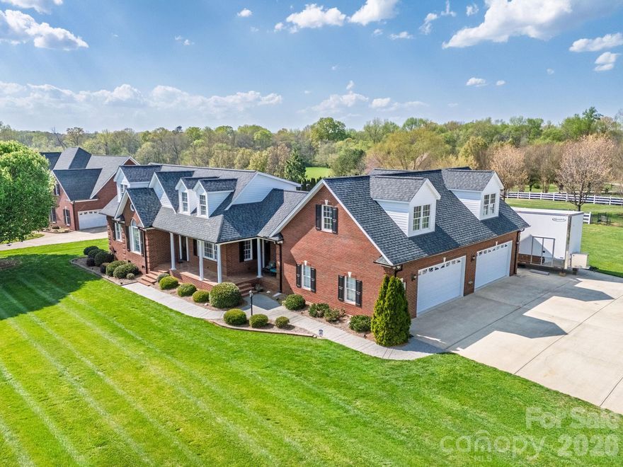 NO HOA~FULL BRICK~4-CAR GARAGE~ROOF 2025~ONE ACRE LEVEL LOT! Your RVs & Boats are WELCOME--This 2-story Home checks all the boxes! Total 4,469 sqft Home is Immaculate with 1,333 sqft 4-CAR Heated & Cooled Garage (MUST SEE this 48' x 28' Garage that could become an added ensuite bedroom). NEW Architectural Roof & Gutters installed MAY 2025. The original owners take great pride in every detail, and it shows! The expansive Front Porch graces this corner cul-de-sac almost 1-Acre level lot. The brick Back Porch overlooks level Backyard. Step inside to an open floor plan that is filled with natural light, gleaming oak hardwood floors and vaulted ceilings. The heart of the home is the spacious family room with vaulted ceilings and fireplace. The Kitchen is a focal point for gatherings with island and seating. Main level primary bedroom suite has beautiful oak hardwoods and ceiling fan, custom tile inlay, dual vanity & walk-in closet. Main level laundry room provides extra storage w/ cabinetry, countertops & sink. Upstairs there are 2 additional Bedrooms each with ensuite full bathrooms, dormer windows & walk-in closets. The impressive Bonus Room provides plenty of space for all entertainment, complete with built-in shelving AND back staircase to Garage. Enjoy living in well maintained community with no HOA! Encapsulated crawlspace with dehumidifier keeps the environment clean. This home even has a Transferable Termite Bond! Home Warranty provided with acceptable offer.