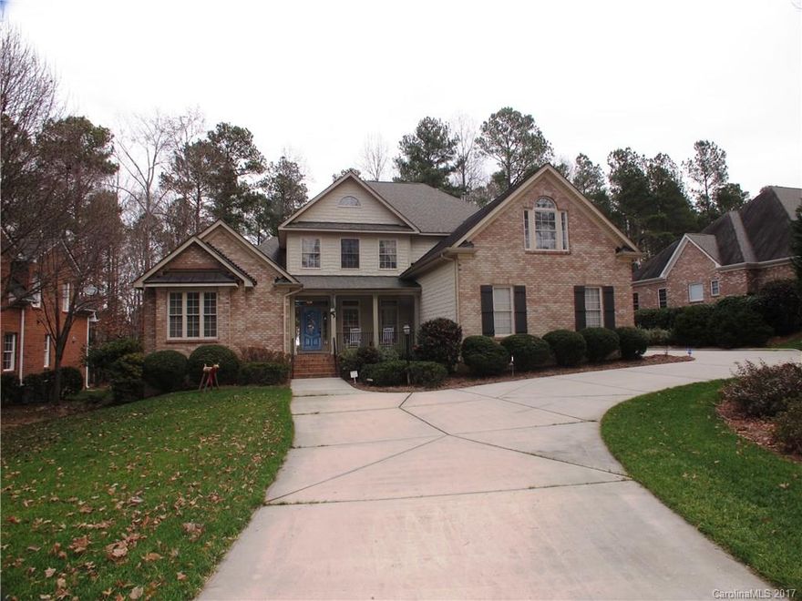 Pristine all brick home on half acre.Upgrades galore.This gorgeous 2story features gleaming hardwood floors,master suite on main level has closet w/ built ins,jacuzzi tub,den w/ cathedral ceilings and extensive wood,Formal dining, 2story great room w/fireplace and balcony,kitchen w/ granite counters, tile back splash, snack bar,42"custom cabinets, double oven w/ one being convection,pull outs,bead board.Each room has own bath.Tile screened porch,large yard w/ fire pit, patio pavers and side walk