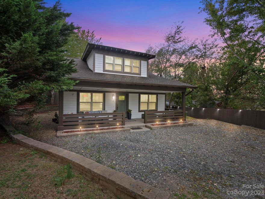 Built in 2015 and having only one owner this gorgeous bungalow is only 10 minutes from downtown Asheville. Located just a quick drive to the I-40, I-240, and 74, this home is perfectly situated.  Boasting 4 bedrooms, 2 bathrooms, quartz countertops in the kitchen and bathrooms and gorgeous wood flooring throughout, this house is the perfect place to settle in and call home.  Privacy abounds in the massive primary suite with its own seating area and laundry room - no more carrying laundry up and down the stairs, yes there's a laundry on the main level too!  The front porch is perfect for kicking back and enjoying the beautiful weather Asheville offers and the backyard is perfect for those weekend cookouts with friends.