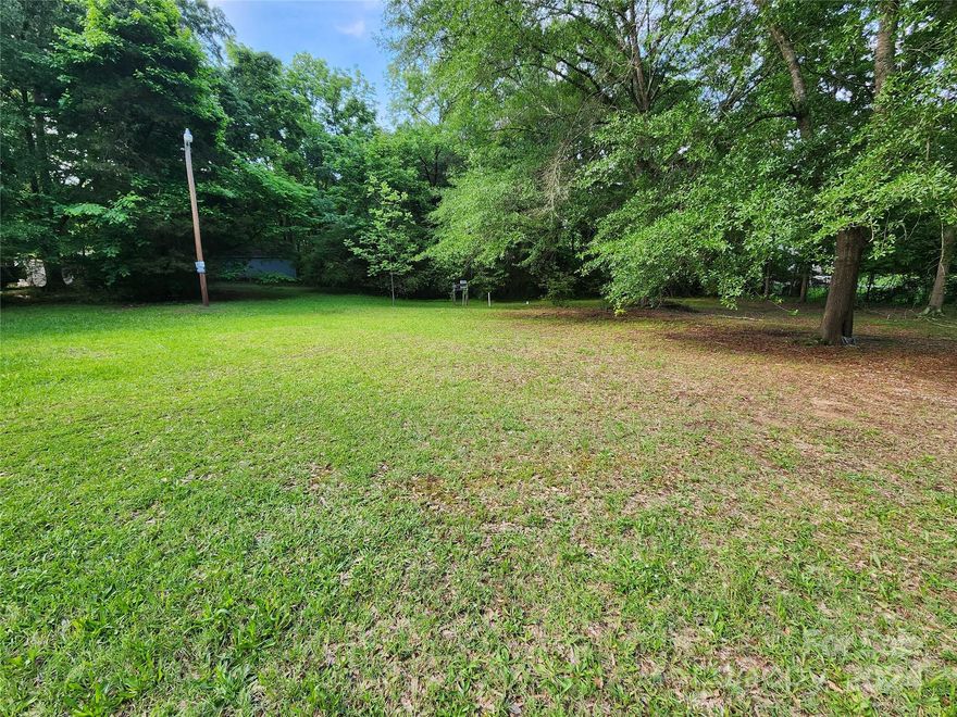 Large building lot that has had a mobile home on the lot in the past.  It had been previously connected to water and sewer but unaware of connections and any additional fees that may be applicable.  Nice level lot with 2 possible entrances.  The front half of the lot is cleared with tress on the back part.  Excellent building lot close to Hwy 9.