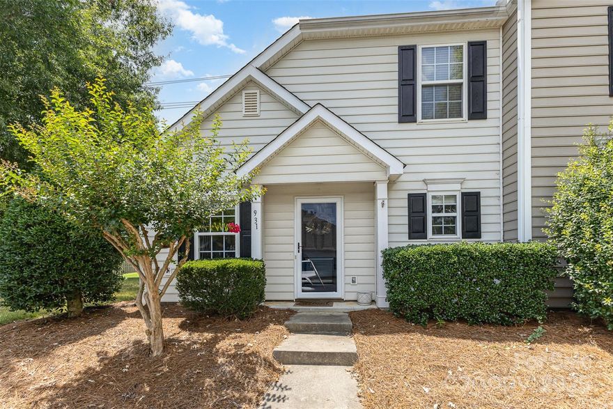 Charming 3 bed, 2 bath end unit townhome in Fort Mill with the primary bedroom on the main floor! This light-filled home features white neutral paint throughout, new flooring, and an updated kitchen with quartz countertops. Enjoy a spacious laundry room downstairs, enclosed patio for outdoor relaxation, and two dedicated parking spaces. The open layout and great natural light create an inviting atmosphere. Located in a desirable community with a neighborhood pool and close to top-rated Fort Mill schools, shopping, and dining. Move-in ready!