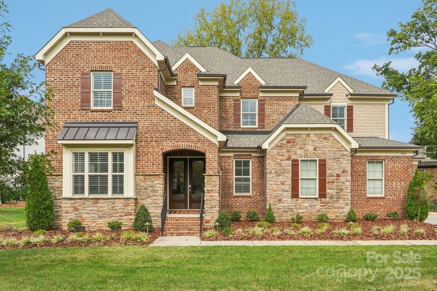 Experience refined living in one of Union County's prestigious gated communities, ideally located within the top-rated Marvin school district. This beautiful residence offers a perfect blend of elegance, comfort, and everyday functionality, designed for entertaining and effortless daily life. 
An inviting foyer with wainscoting and an elegant curved staircase welcomes you inside, while french doors open to a private home office/study. Architectural details are showcased throughout, from detailed moldings to the graceful flow of open living spaces. The dramatic two-story dining room is idea for hosting gatherings, featuring a butler's pantry and a large storage closet that could easily convert to custom wine storage. 
The spacious great room highlights a stunning stone fireplace, coffered ceiling, and seamless connection to the gourmet kitchen. Designed for the inspired home chef, the kitchen boasts a center island, abundant cabinetry, gas cook top, 2 electric stoves, microwave, walk-in pantry. Generous breakfast area has French door leading to a covered terrace and paver patio, perfect for outdoor dining and relaxation.
A convenient office/computer station, private powder room, and thoughtfully designed laundry room with built-in cabinetry and board and batten trim enhance the home's function and charm. The drop zone offers practical storage with a shiplap wall, cubbies, and hooks for coats, shoes, and bags, plus an oversized storage closet. 
A guest suite on the main level provides privacy and comfort and ensuite bath. Pre-finished hardwood floors grace the main living areas, with tile in the laundry and baths, and carpet in the guest suite. 
Upstairs, the primary suite is a true retreat featuring a spacious sitting room-perfect for a private escape, nursery, or second office. The elegant ensuite bath includes two vanities, a soaking tub, an oversized shower, and two large walk-in closets. 
The upper level also offers a cozy loft with shiplap accent wall and hardwood floors, plus three additional bedrooms-each with bathroom access, carpet flooring and generous walk-in closets. 
Enjoy outdoor living int he private, fenced backyard surrounded by lush landscaping. Whether hosting friends, relaxing on the covered terrace, or dining al fresco under the stars, this backyard is your own personal haven. Additional highlights include abundant storage throughout, a secondary staircase offering convenient back access, and timeless craftsmanship in every detail. 
This exceptional home captures the best Union County living-an elegant, comfortable, and thoughtfully designed retreat in a secure gated community, just minutes from shopping, dining and the award winning Marvin schools.
Refrigerator in kitchen conveys. Refrigerators in laundry room and garage do not convey.