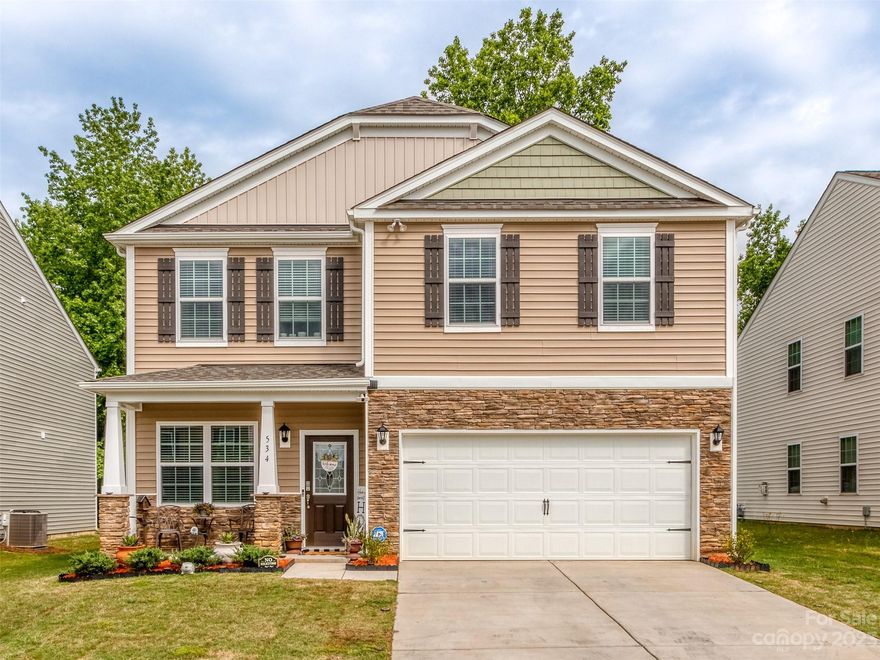 Better than NEW!!  This beautiful Clover home features four bedrooms, 2.5 baths, family room with gas fireplace, generously sized dining room, lovely kitchen with gas range, granite countertops, stainless appliances and an adorable pet closet to house all of your pet's belongings.  Parking is easy with a two car garage and flat driveway. if you are looking for privacy the backyard is hard to beat.  Backing to woods, with a full privacy fence and new shed.  This home has been meticulously maintained and is move in ready.