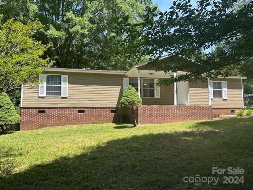 Check out this NEWLY REMODELED home on 5.48 acres with views! This 3 bedroom, 2 full bathroom property has a new roof, new HVAC, new vinyl plank flooring throughout, new paint, new fixtures, new deck, new electrical wiring, new plumbing, new insulation, and much more!  You will have plenty of room to enjoy the outdoors with the secluded 5.48 acres with beautiful trees, barns, buildings, blueberry trees, muscadines, creek, fence on property and beautiful views! Each bedroom has an oversized closet.  You will not want to miss out on this home!

$1,200 Appliance Credit available with acceptable offer.