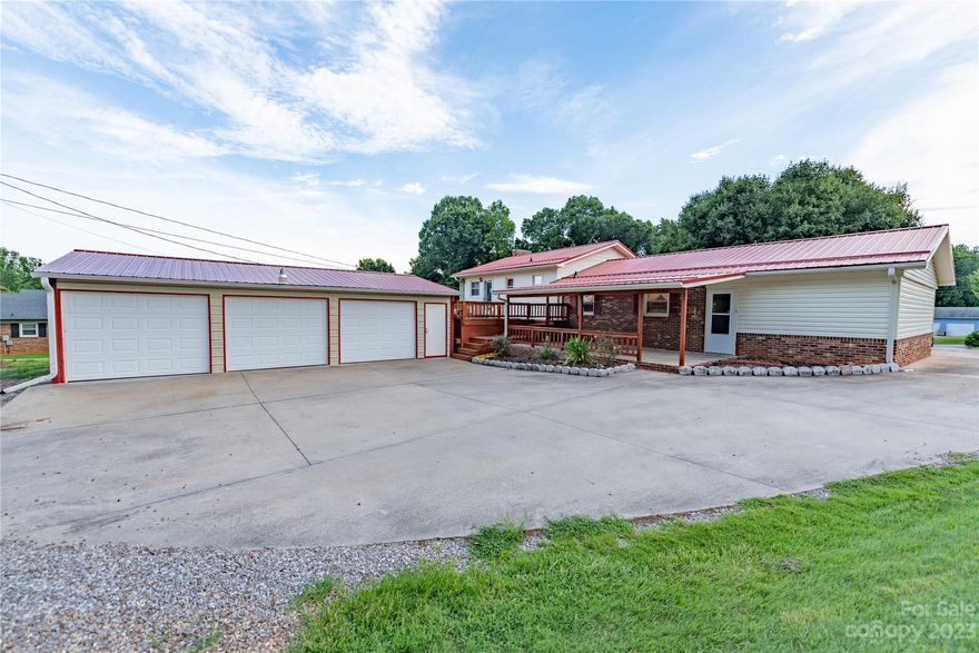 Beautiful 3 Bedroom, 2 1/2 Bath home with single car attached and 3 car detached garage in the Cloverdale community. Need room for multiple cars, ATV's or motorcycles? Large detached garage could also be a shop or just a place to store your toys. Notice the personal heated pool and rear deck off the master, cozy covered rear patio and large brick basement fireplace. Big & beautiful yard with great privacy in the back of the home for cookouts or family entertainment. New roof in 2018. Short drive to shopping and downtown Wilkesboro, 2 miles to grocery store and restaurants, 1 mile to West Wilkes Middle school.
