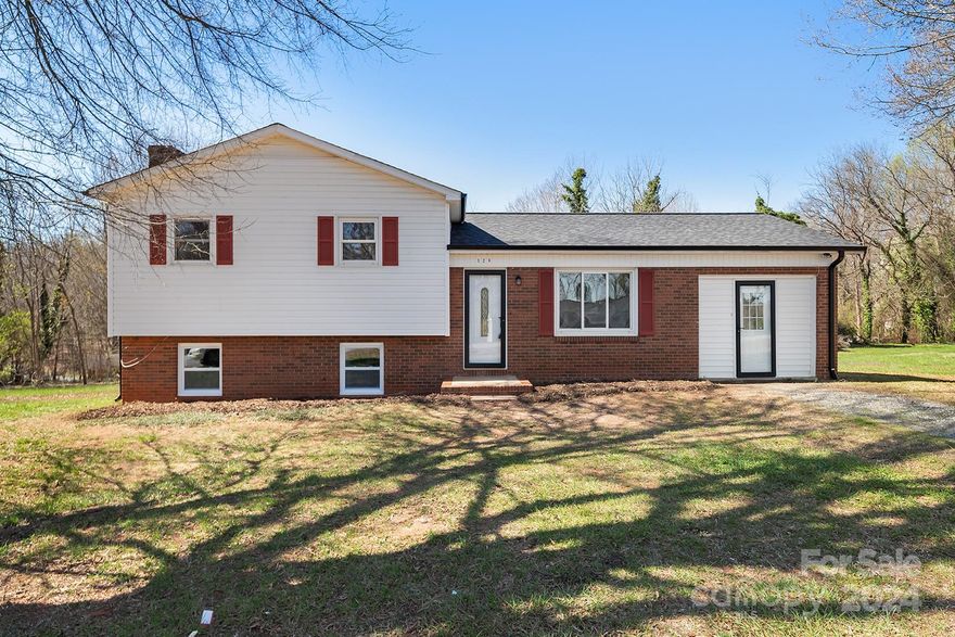 Nestled in the quaint neighborhood of Shannonbrook, this completely remodeled cul-de-sac home features a split level floor plan, 4 bed/1.5 ba on 0.55 acres. You will be impressed upon entry w/the outstanding updates of this home. The kitchen has that WOW factor, all new SS appliances including a gas range & fridge w/icemaker, gorgeous white cabinets, deep sink & tile backsplash. Floor plan features an open living room & bedroom/office/flex room on main. 3 bd and 1 full ba on 2nd level. The completely finished basement features a wood burning fireplace, flex room, laundry room w/ 1/2 ba. Tons of natural light throughout the home shows off the luxury vinyl plank flooring, all new interior paint, modern LED light fixtures & stylish ceiling fans. New roof, new gutters, new spacious rear deck, main level bedroom/flex room features a new Trane split heat/air system w/remote. This is not your average remodel & sure to impress. Walking distance to Heritage Trail Greenway for walking & biking.