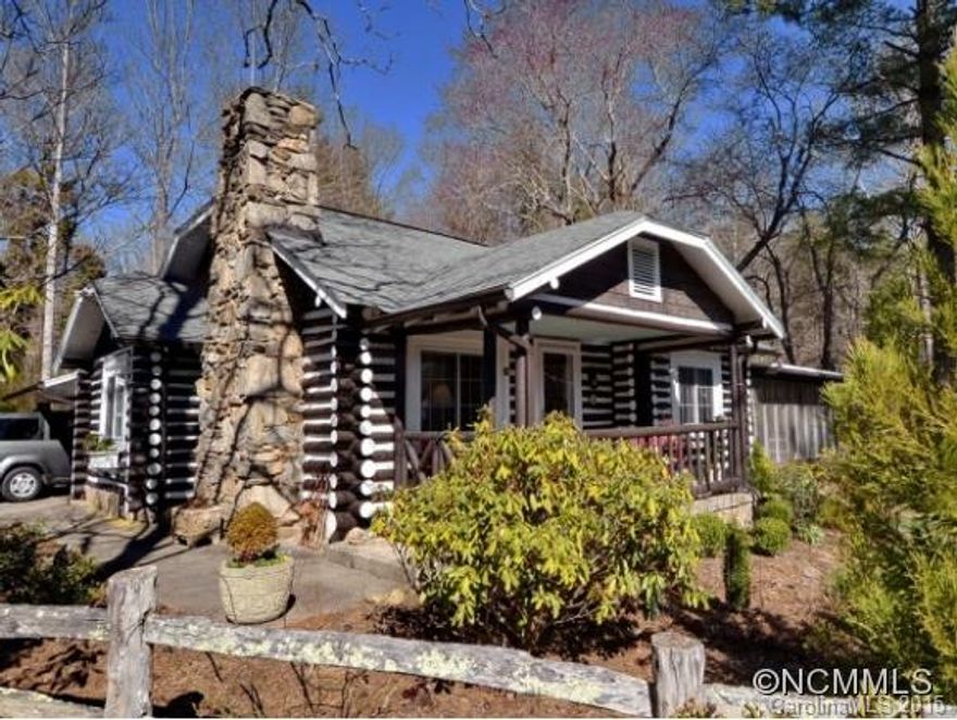 Vintage Carolina log house that's both rustic and refined. Major renovations over the past two years bring Old World charm up to date. Move-in ready with two-car garage and extensive, low-maintenance landscaping.
