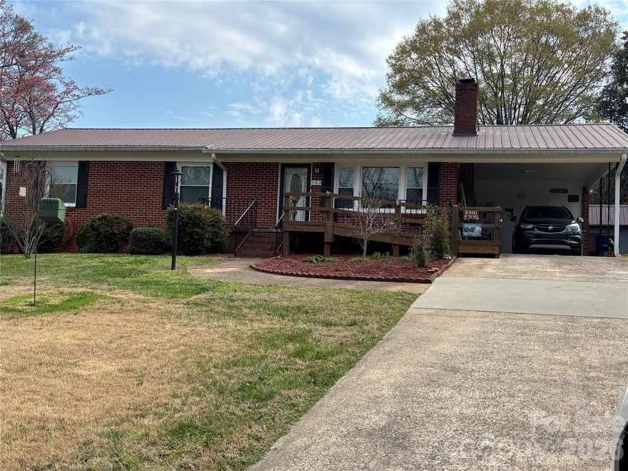 Over 1600 sqft of living space!
Step into this beautifully preserved 1962 brick ranch where classic charm meets thoughtful functionality. Immaculately maintained, this home showcases original hardwood floors and stunning, well-preserved vintage tile bathrooms that offer a timeless nod to its era. The inviting sun porch provides the perfect transition into a private mother-in-law suite, ideal for extended family, guests, or flexible living arrangements. With dual laundry areas, convenience is built right in. Pet lovers will appreciate the uniquely crafted, solid built-in pet doors are just one example of the thoughtful details throughout. A detached workshop offers additional space for hobbies, storage, or creative projects.

Every inch of this home reflects pride of ownership. Clean, charming, and exceptionally well cared for, this is a rare opportunity to own a truly special property with character you simply can’t recreate. The backyard has decorative fencing as well as an underground system.