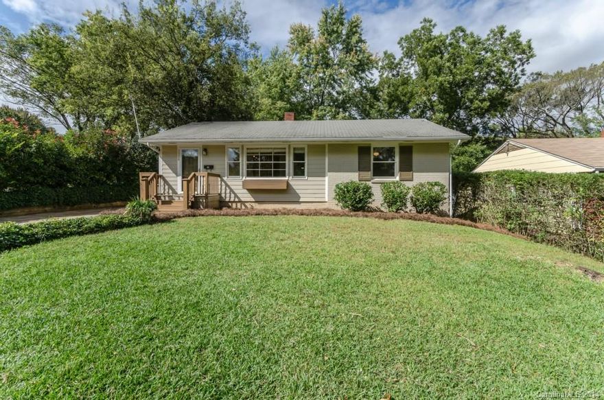 Wonderful bungalow in sought after Sedgefield!  Open floor plan incorporates kitchen, living area, dining area, and french doors that open to covered porch overlooking deep, mature lot.  Porch has retractable shades on all sides for added privacy.  Hardwoods throughout most of home, Fresh paint, new HVAC 2012.  Major renovation in past included addition of porch,pantry,laundry,utility room; new windows(except the original picture window), and hardboard siding. Fantastic space in and out!