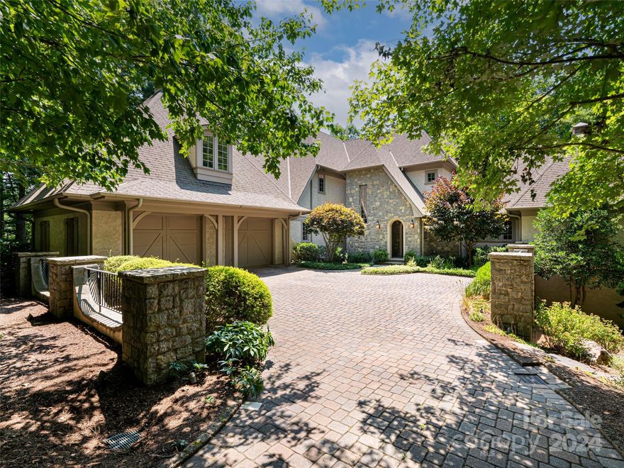 Architect Bill Ashe designed this house to take full advantage of the privacy on this very special wooded lot. Zero entry from the garage, an elevator to all 3 floors and other accessibility features will enable many years of comfortable living in this gorgeous stucco and stone European home. Wood burning fireplaces with gas logs are located in the living room and keeping room. The stunning vaulted screened porch has a W/B fireplace with a gas starter and there is an additional fireplace in the unfinished walk-out basement level family room. The unfinished basement already has plumbing, lighting and partial sheetrock as well as a full finished bathroom not counted in the main bedroom/bath count. The basement spaces allow for ample storage, workout, workshop or an extremely affordable way to add additional bedrooms and living space if desired. Enjoy all Ramble amenities - gated with 24hr patrol, pool, parks, the Living Well Center, miles of trails, Longmeadow Park, Buckspring’s Cabin.