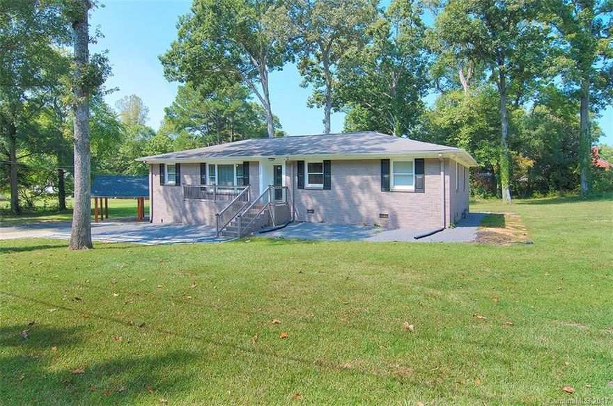 Job opportunity/relocation has just made this well appointed home on almost 2 full acres in Charlotte available to you! Remodeled open floorplan is a must see! Three bedrooms plus additional bonus room/office all on main level. Home needs the finishing touches as the remodel of two baths is to be completed by new owner if desired. Basement, garage, carport, lots of land. Great location, minutes to 485 access, uptown Charlotte and quick trip to LKN. Enjoy all Charlotte has to offer, Welcome Home!