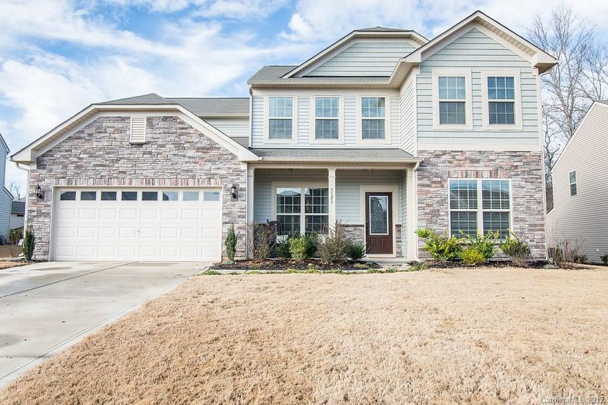 Gorgeous Wingate floorplan in desirable Audubon Lake. Low taxes and close to Ballantyne! Covered front porch accented with stonework, Granite in kitchen and bathrooms, hardwood floors, gourmet cabinetry and gas range, butler's pantry, huge island, desk nook/workplace, gas fireplace, crown molding, wainscoting, trey ceilings, covered porch with ceiling fan, firepit for entertaining, private/fenced/backs up to green space. 

Exclusions with custom light features apply. Please verify with agent.