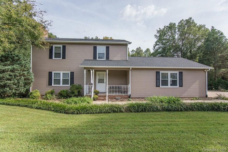 Spacious, well kept home on 1.25 acres! This adorable 3 bed/2.5 bath home boasts a large family room with gas logs, separate living room with additional wood burning fire place, updated paint and laminate wood flooring and a nice yard with a spacious workshop. This beauty will not last long!