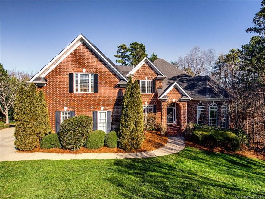 Beautifully updated full brick 2-story home w/finished basement. The premium cul-de-sac lot offers mature landscaping, wonderful play yard & a natural area for exploration. Hardwood flooring throughout main & upper levels. Open layout makes entertaining a breeze. Flexible floor plan offers Bedrooms on all levels & large Basement offers secondary living areas. Total of 6 Beds 6.5 Baths including huge Owner's Suite.  Upgraded Gourmet Chef's Kitchen. Fabulous screened porch with 2 spacious decks.