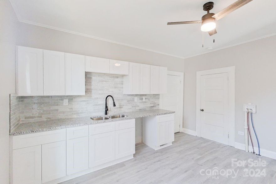 SELLER FINANCING AVAILABLE!! Beautifully renovated ranch home less than ONE MILE from downtown Rock Hill with all permits pulled!  Whether you are looking for a residence for yourself or a turn-key investment property, 109 Highland Street is the house for you!  Walking into the home, you are greeted with brand new siding and an over-sized covered porch. Continuing through the front door you will notice the new Vinyl Plank flooring and fresh paint throughout.  The large living room is the focal point to the home and gives you access to the updated kitchen with new cabinets, range/oven & fixtures with space to add a dishwasher.  The two over-sized bedrooms offer new light fixtures and large closets.  The remodeled bathroom is accessible by all rooms making the floorplan functional for any living arrangement.  The home also includes W&D hook-ups. 
Outside you will find a large level backyard with ample parking available in both the driveway and on the street.  
Don't miss this one!