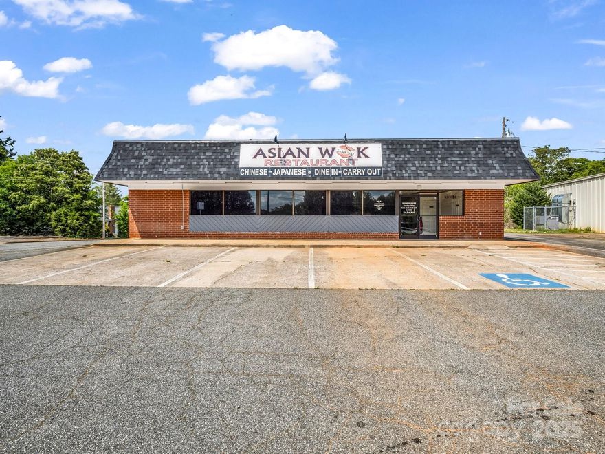 Prime location commercial building on East Main St in Spindale with tons of drive by exposure! This building offers 2400 sq ft, has a drive thru established and comes equipped with a fully operational kitchen, walk-in coolers, ice maker, cookware and dining booths. This business was very successful most recently as the Asian Wok. Sellers have owned this for many years. Building has a new roof, new HVAC and air ducts, new gas line and pipes, new plumbing and water heater as well as new electrical with ceiling grids. Don’t miss the opportunity to establish your dream business here! This property offers endless opportunities!