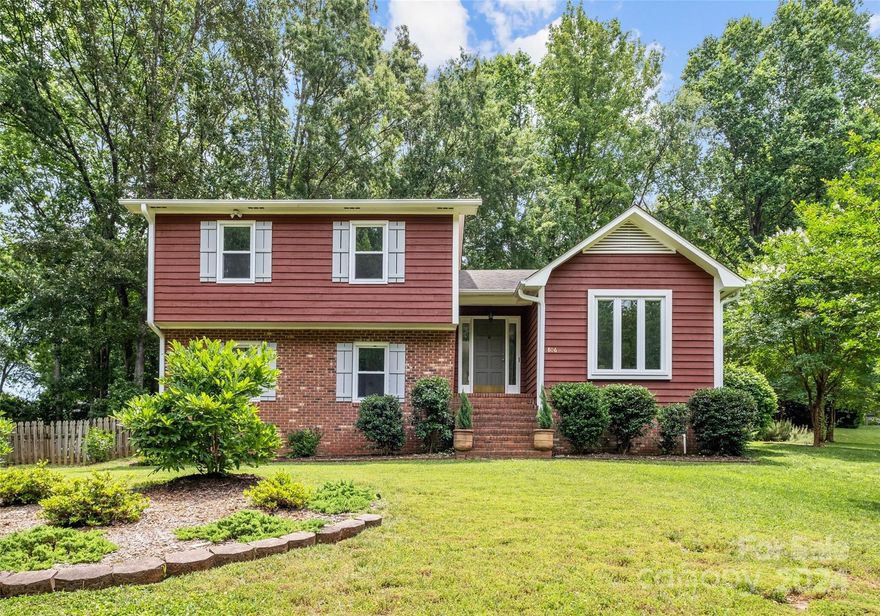 This home is has everything you ever wanted! It is tucked in a beautiful, established neighborhood while still being conveniently located to everything Rock Hill has to offer. When you step in the front door, you will notice the fresh paint throughout, updated kitchen, new flooring on the lower level, and the unique and cozy features the home has to offer. The primary suite is upstairs and has a private balcony overlooking the trees and private backyard. There are 2 other guest bedrooms and a full bath upstairs and a bedroom/full bath downstairs which would be perfect for an in-law suite. The home will have a new roof installed 6/7.