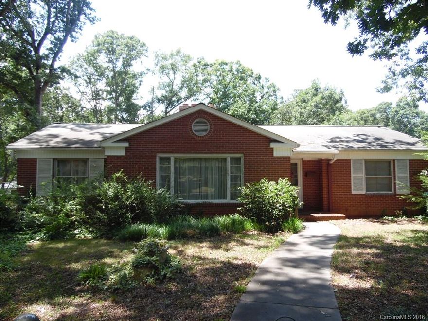 Excellent Forest Hills location - spacious living room with hardwood floors and fireplace. Heart of Pine Paneling in den or 3rd bedroom. Basement features finished bonus room with fireplace.