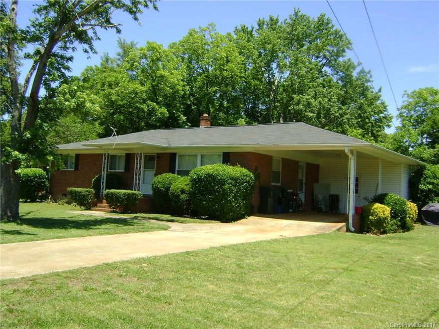 Nice 3BR/2BA brick home in convenient location. Level and fenced back yard. Nice solid hardwood floors. Carport could be easily converted into garage if desired. Terrific location across from Cherry Park.