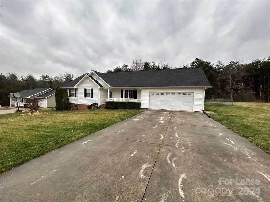 New to the rental market must see home.  This home has a large living room, dining area off kitchen with Granite counters, comfortable sized bedrooms and beautiful updated bathrooms.  Huge half acre fenced in lot.  Oversized Garage with shop area.  Great back deck, partially covered.  Whole home is electric and utilities run approximately $200 or less per month.