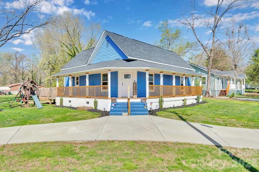 Step into the perfect blend of 1910 character and 2026 peace of mind. This stunning 3-bedroom, 2-bathroom home has been meticulously reimagined, offering the soul of a historic home with the high-end finishes and structural integrity of a new build. The interior was completely taken down to the studs and updated in 2022. The kitchen serves as the home’s centerpiece, featuring warm butcher block countertops that provide a perfect organic contrast to the modern cabinetry as well as an island. The open layout flows seamlessly, making it an entertainer's dream. Retreat to a primary suite designed for ultimate relaxation. The spa-like bathroom boasts, an oversized, custom-tiled walk-in shower, freestanding soaking tub, and a sleek double vanity with contemporary fixtures. Situated on a spacious corner lot, the home welcomes you with a classic wrap-around porch—the ideal spot for morning coffee or evening sunsets. Forget the "old home" maintenance; every major system has been replaced for efficiency and longevity: HVAC & Gas Furnace: Brand New (Dec. 2025), Roof (2022), Windows: Energy-efficient replacements (2022), Electrical & Plumbing: (2022). This is a rare opportunity to own a turnkey historic gem where all the "big ticket" items are already done. Schedule your tour today!