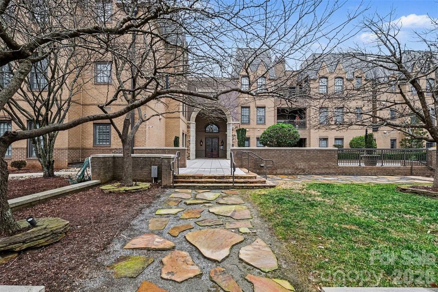 Discover elevated penthouse living in the heart of Dilworth, one of Charlotte’s most vibrant and sought-after neighborhoods. This stunning residence at Parkwood Knoll blends timeless architectural character with modern comfort, offering an exceptional lifestyle in a secure, beautifully maintained community.

Natural light pours into the home through its distinctive turret design, creating a bright and inviting living space filled with charm and architectural interest. Thoughtful custom built-ins provide both style and functionality, while a spacious laundry room with custom cabinetry adds everyday convenience.

Outdoor living is a true highlight. Enjoy your own private patio, perfect for morning coffee or relaxing evenings, along with access to an expansive shared rooftop terrace that offers additional space to unwind and entertain while enjoying the surrounding views. A gated grassy area provides a welcoming space for dogs and outdoor enjoyment, reflecting the warm, neighborly atmosphere that makes this community so special.

Residents enjoy the peace of mind of a secure building with controlled access and a gated parking garage. Two premium parking spaces are conveniently located near the elevator, and a spacious private storage unit within the garage offers valuable extra storage rarely found in condo living.

Ideally located just minutes from Dilworth’s restaurants, boutiques, parks, and Uptown Charlotte, this exceptional penthouse combines stunning design, convenience, and an unbeatable location. With a strong sense of community, wonderful neighbors, and beautifully maintained surroundings, this home offers the perfect balance of luxury and ease in one of Charlotte’s most desirable areas.