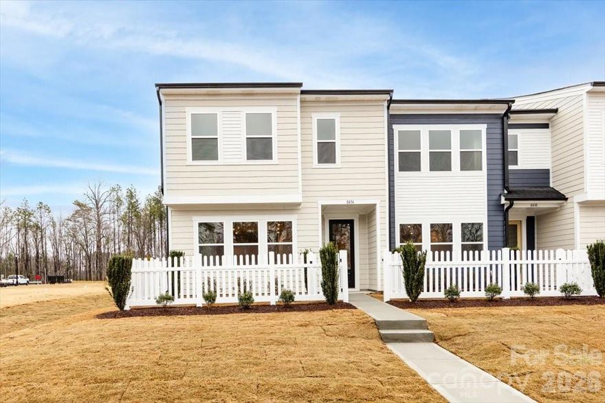 Designed to live with you and elevate everyday moments, this Fisher end unit home brings space, style, and connection together in one thoughtful design. With 1,888 square feet, 3 bedrooms, 2.5 baths, and an open-concept layout, the home offers flexibility for family life, workdays, and everything in between. Carefully planned by an expert design team, the spaces feel welcoming from the moment you step inside. As an end unit with no front neighbors, the home enjoys added privacy and light. The chef’s kitchen features stained cabinetry, quartz countertops, a herringbone backsplash, and a direct vent, creating a beautiful centerpiece for gathering. A fenced-in front front yard offers a outdoor retreat, while a rear-load two-bay garage with a full-length driveway adds everyday convenience. Located near the community dog park this home extends the lifestyle beyond the home, offering space to connect, unwind, and enjoy the neighborhood.