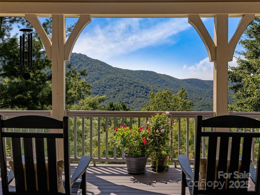 Unobstructed MOUNTAIN VIEWS. This exquisite, custom-built, one-owner residence offers an unparalleled blend of natural beauty and harmony with nature, providing a sanctuary where every detail has been thoughtfully curated. Beautiful hardwood floors and vaulted ceilings greet you. Enjoy convenient and private access to your luxurious primary suite, thoughtfully positioned on the main level. Relax by any of the 3 elegant fireplaces that enhance the inviting atmosphere throughout the home. Cook with ease on the Wolf cooktop, surrounded by stunning Medallion cabinetry in this user-friendly kitchen. Thoughtful build-ins throughout. Ensure uninterrupted comfort with a built-in generator. Professionally designed landscaping creates a stunning outdoor environment, complemented by a covered and open deck for year-round enjoyment. Surrounded by lush trees and abundant wildlife.  Approx 15 minutes to the AVL airport.  Convenient to Hendersonville, Brevard, and Asheville!